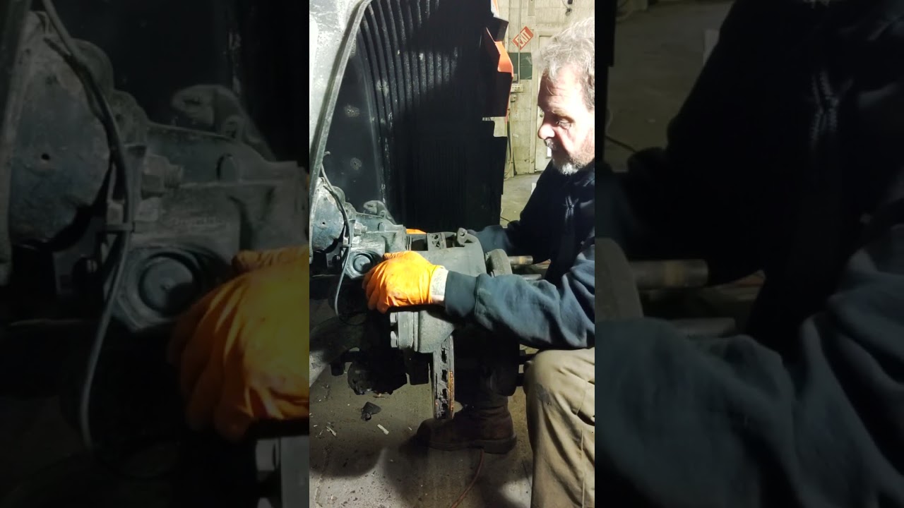 Air disc brake pads instal on a Volvo VNL truck tractor