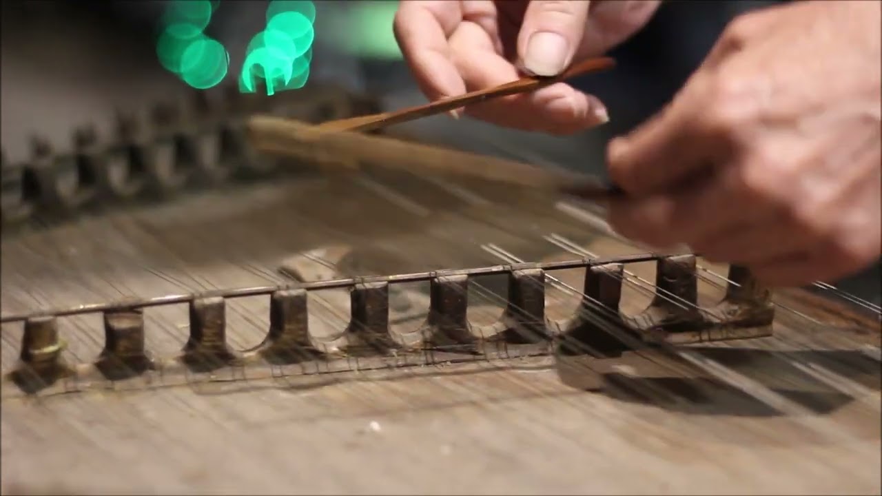 Tom Sanders playing Hammer Dulcimer on the streets of New Orleans