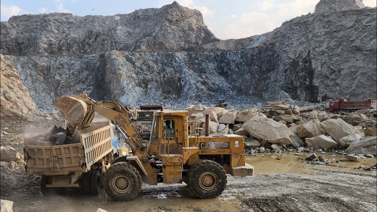 Caterpillar 966D Massive Rock Loading into Hino & Mitsubishi Dump Trucks | Heavy Machinery in Action