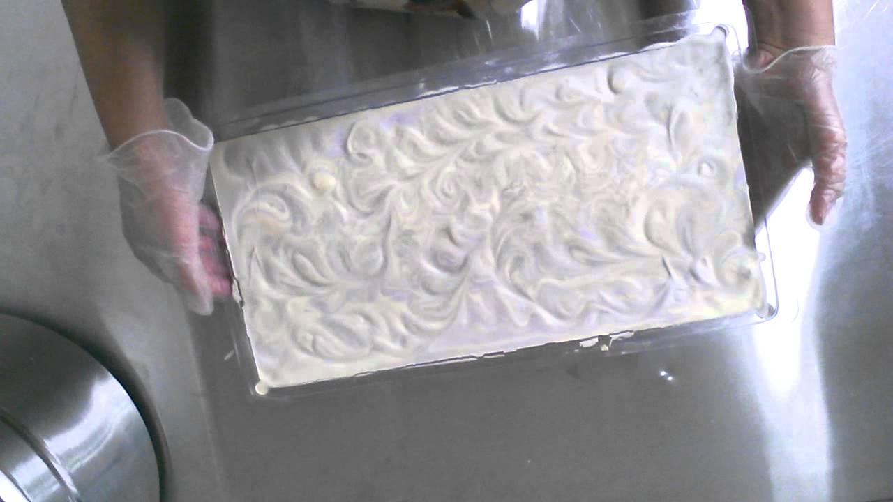 Unmolding Lemon and Lavender type scented soap from a plastic Milky Way big tray rectangle soap mold