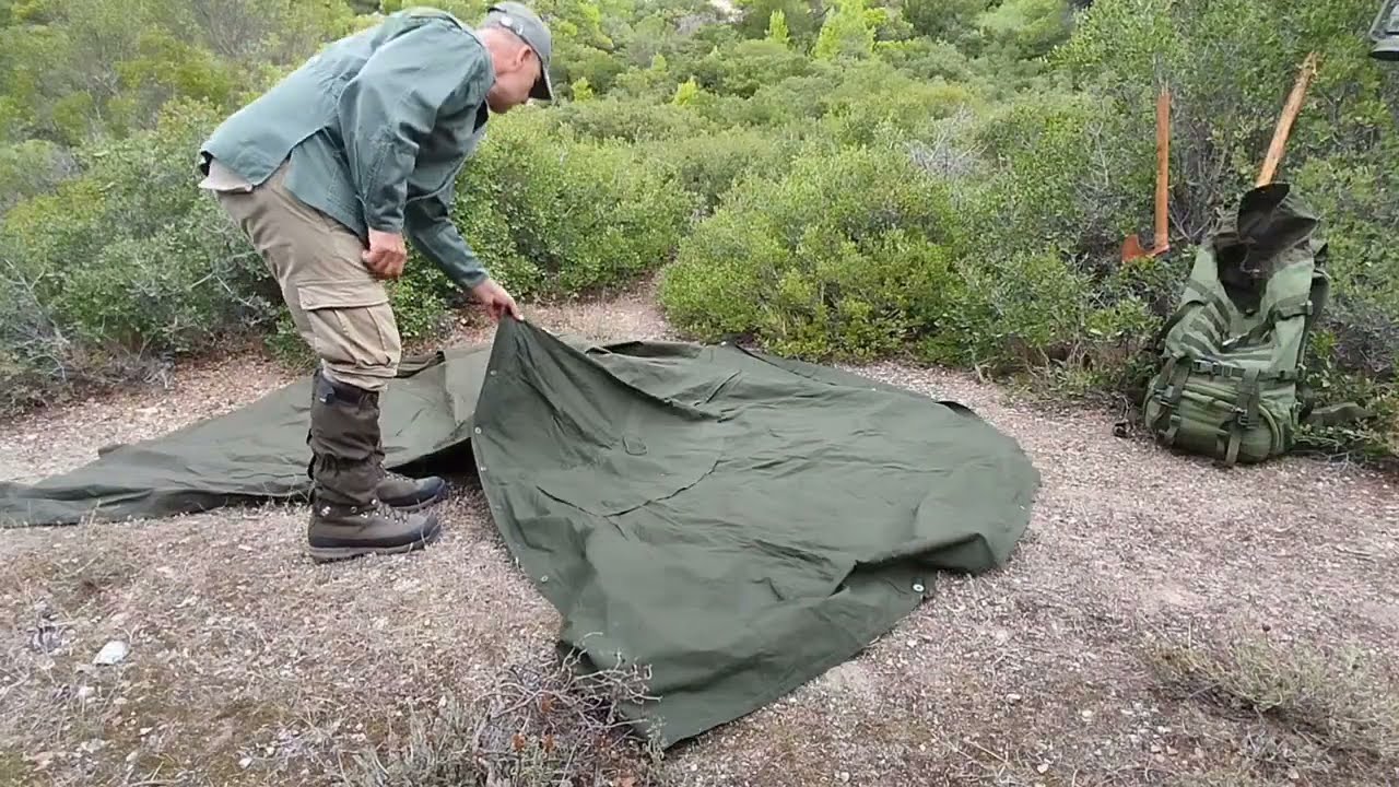 A rainy day in the forest with a lavvu tent 