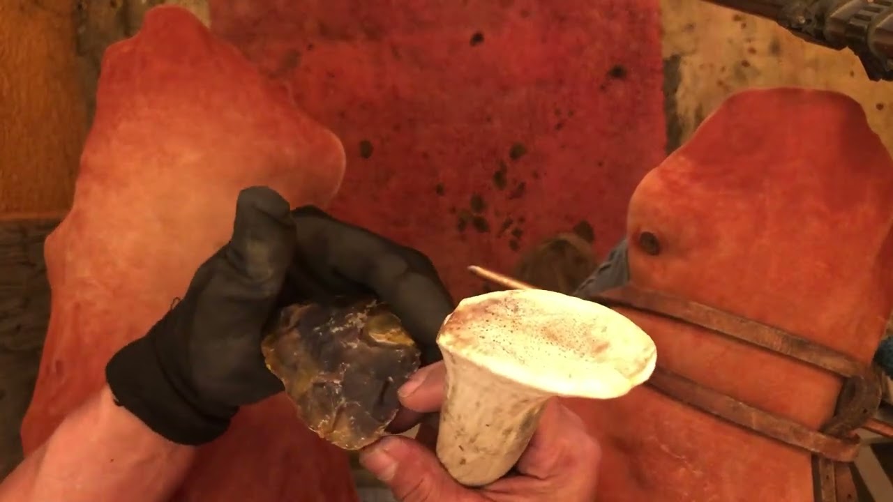 Knife River Flint biface worked with indirect steel rod