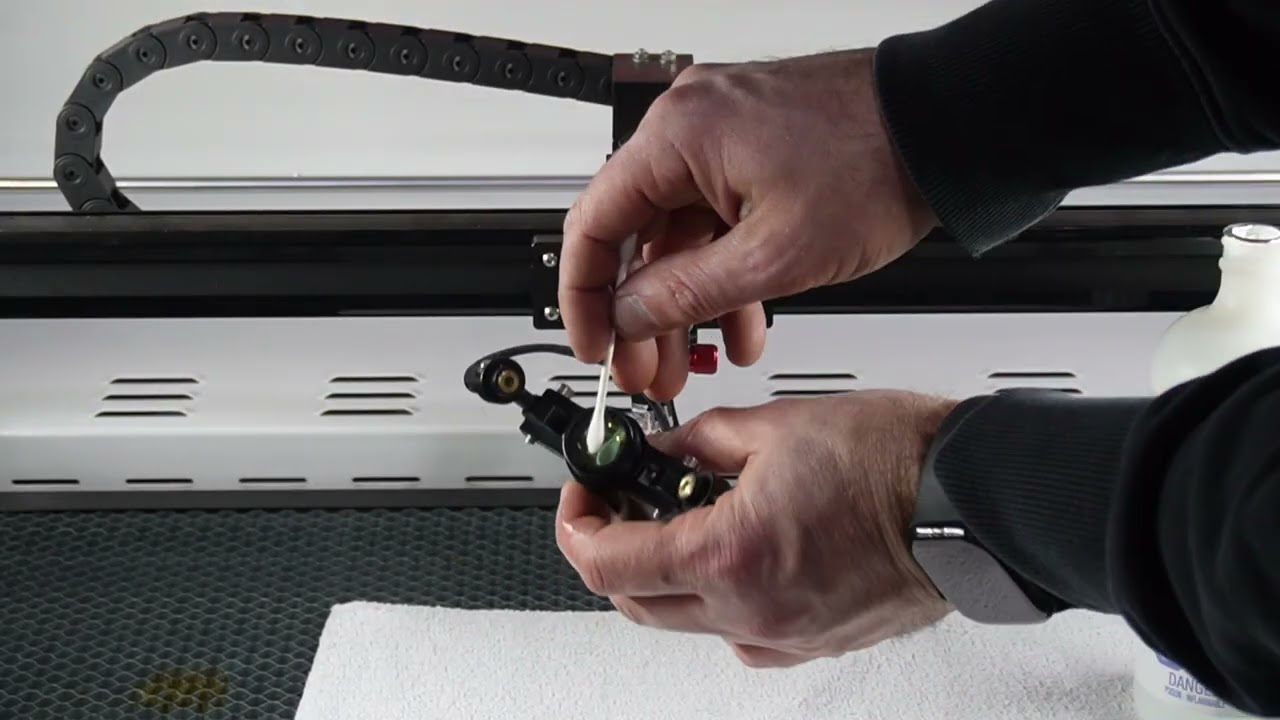 How to change or clean your lens on a RM Laser J Series