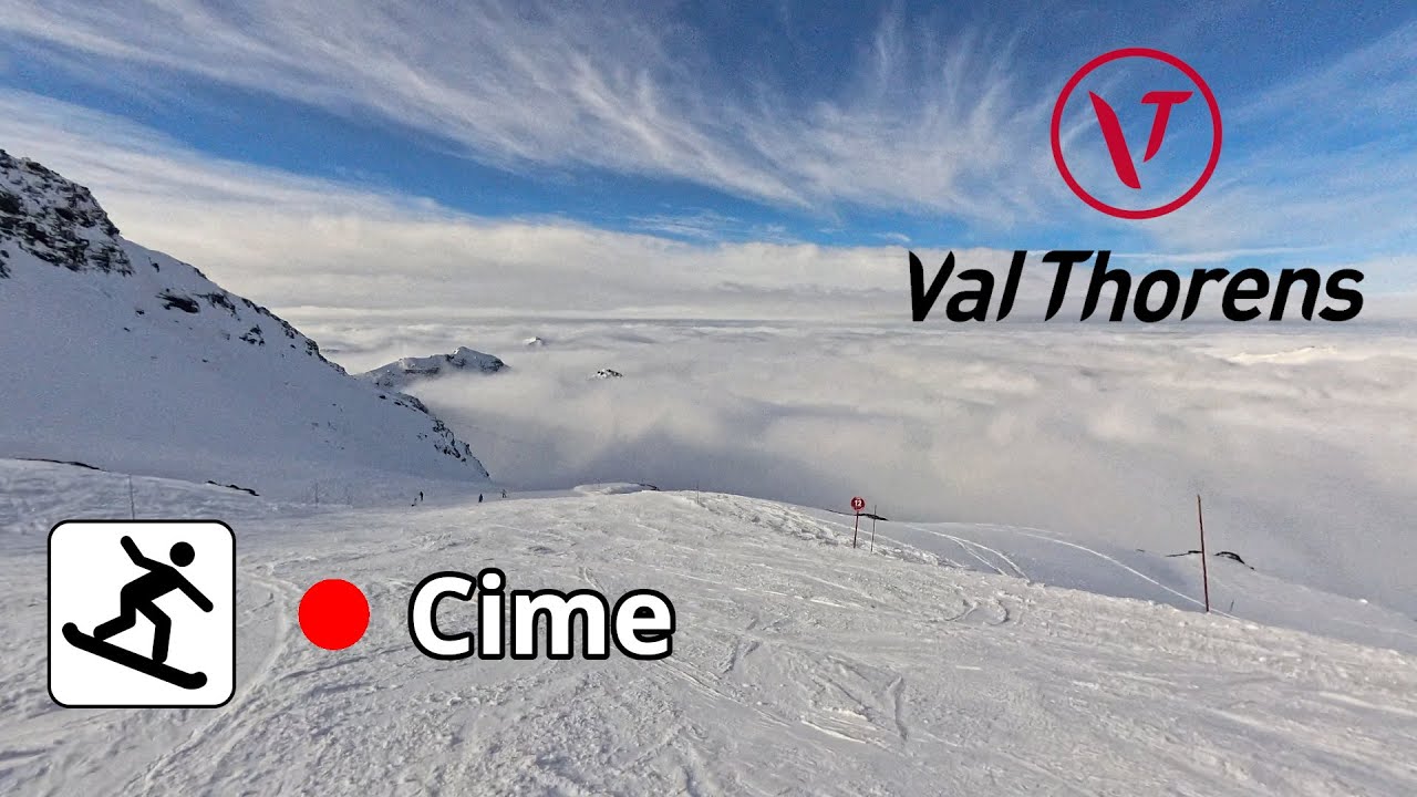 Snowboarding Les Trois Vallées, Val Thorens - Cime Caron above the clouds