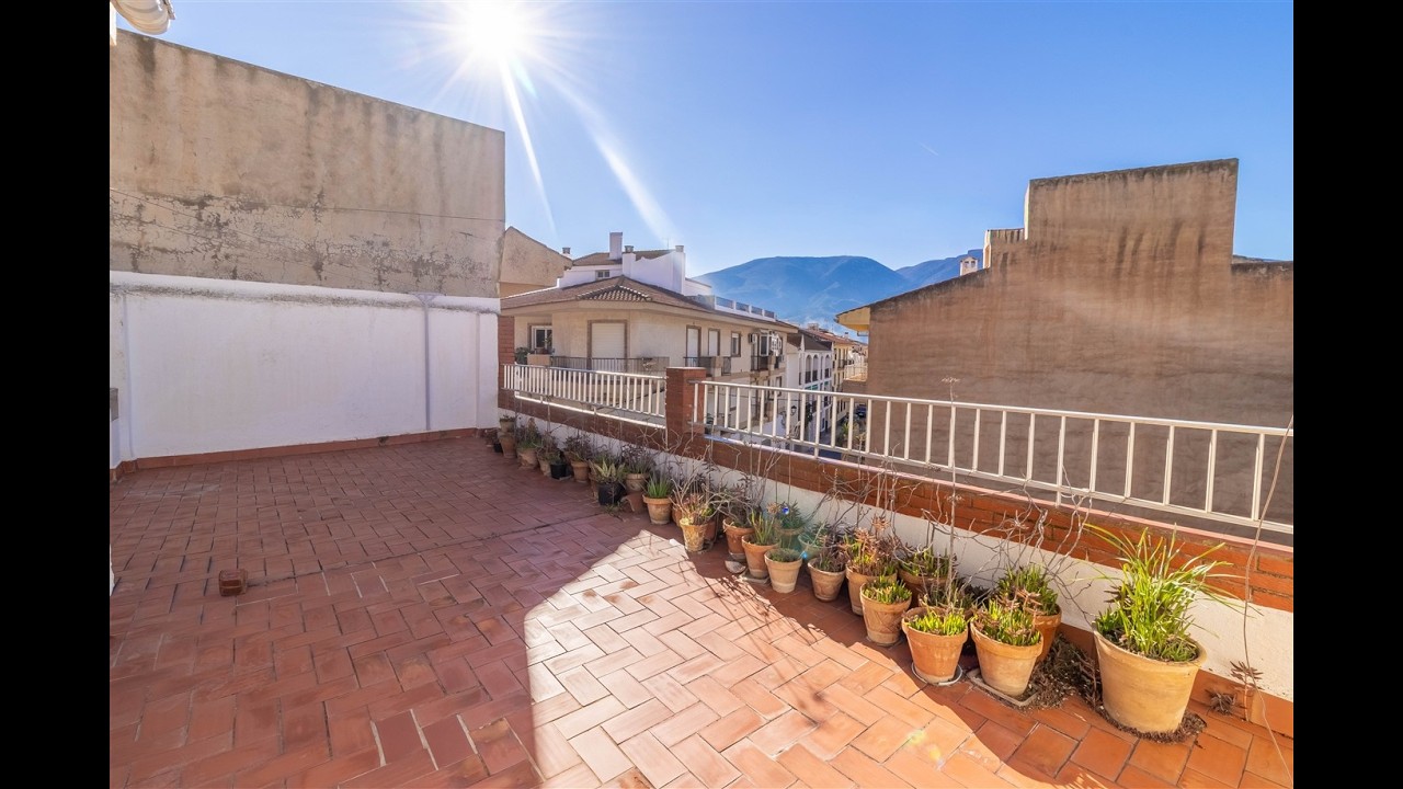 Spacious South-Facing Village Home (264m2) with Garage and Rooftop Terrace in &Oacute;rgiva.