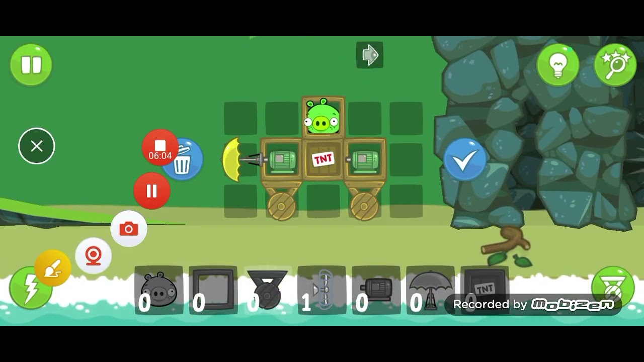 Хрюшка катится к финишу в игре Bad Piggies 
