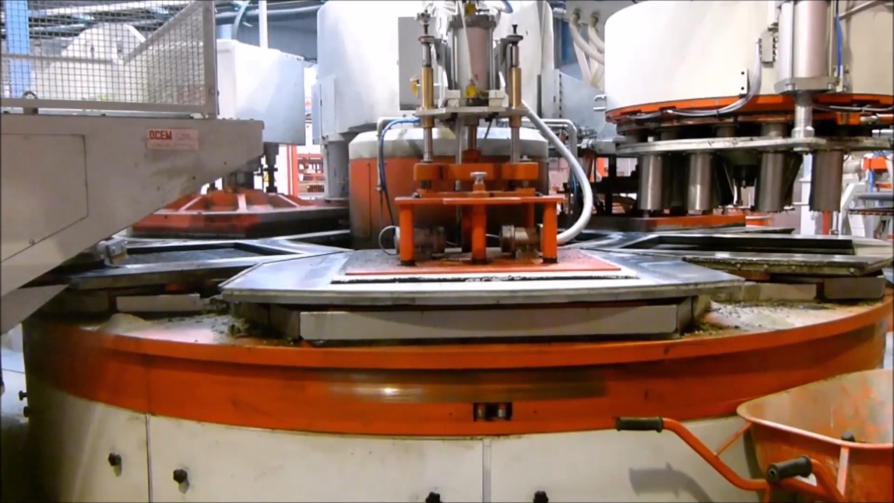 OCEM press OPA1480 produding big double-layer 1000x1000mm concrete agglomerate slabs