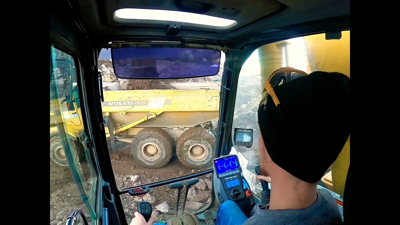Komatsu PC240 Loading Rock Trucks
