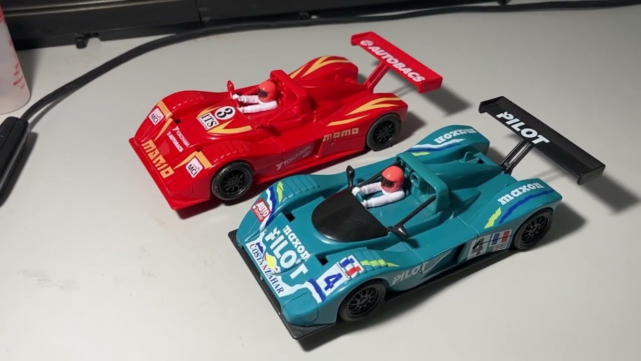 SCX Ferrari 333SP slot cars visit the Hydration Station