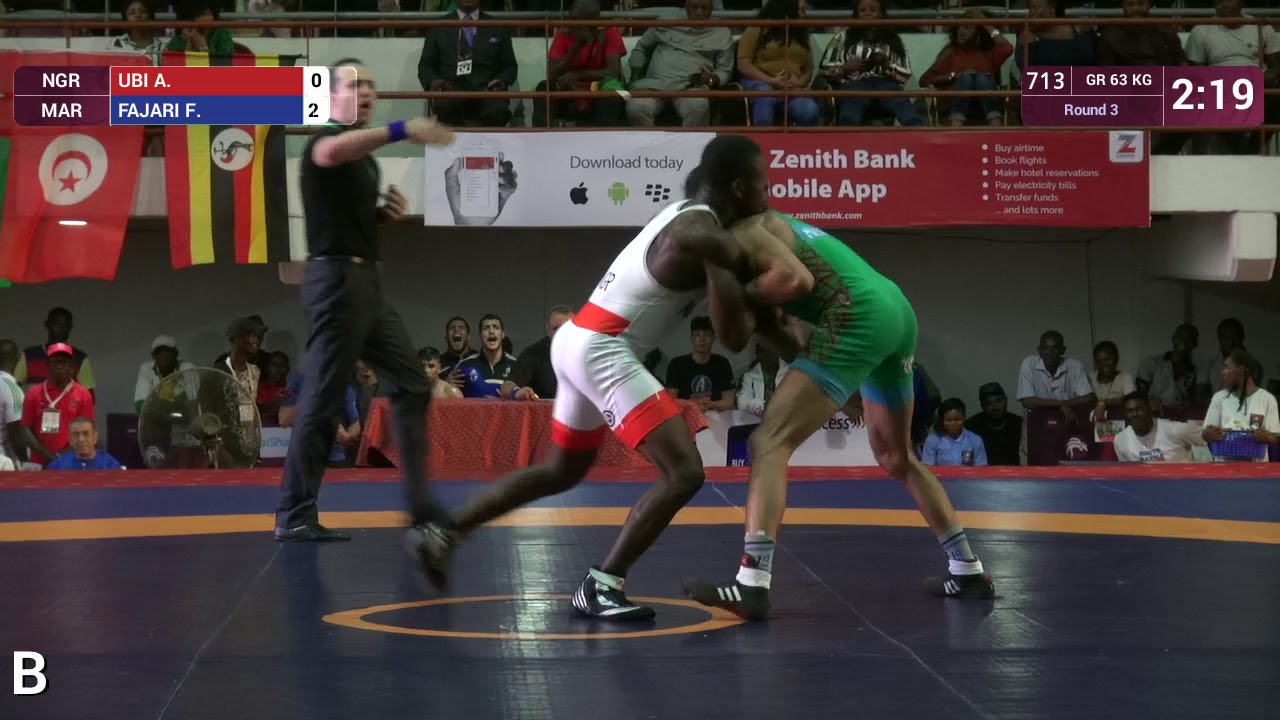 Round 3 GR - 63 kg: A. UBI (NGR) v. F. FAJARI (MAR)