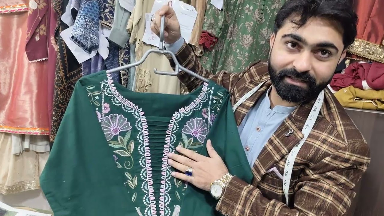 Zee National Tailor International market model town M block Mobil nbr 03034347903