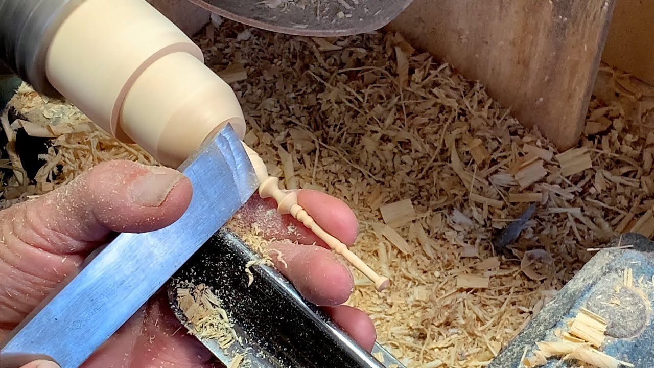 Richard Raffan turning a thin finial for practice