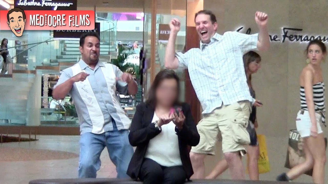 Dancing Behind People at the Mall
