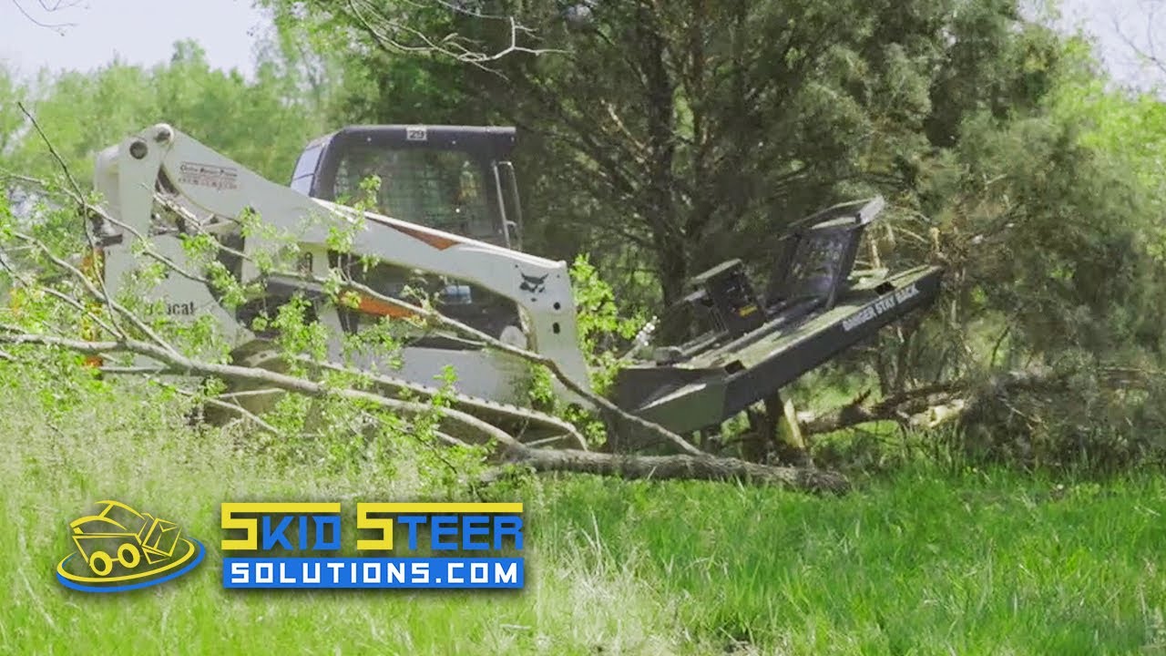 Расчистка земли с помощью кустореза CID X-Treme Tree Reaper | Решения для мини-погрузчиков