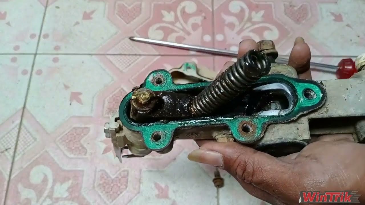 Bongkar pasang lengan tanam padi pada iseky pc4
