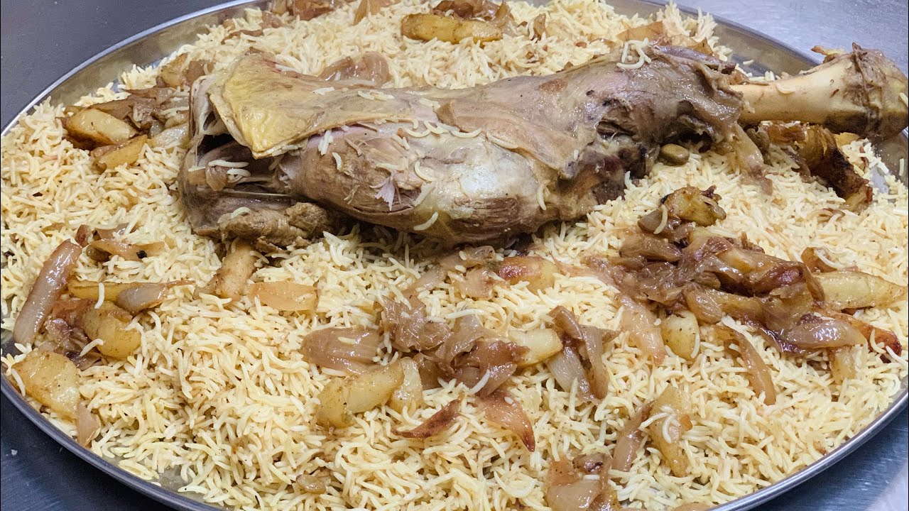 Arabic lamb & rice  lamb leg & Shoulders رز عربي قوزي كتف الغنم مع الارز برنج عربى ران ودست گوسفند