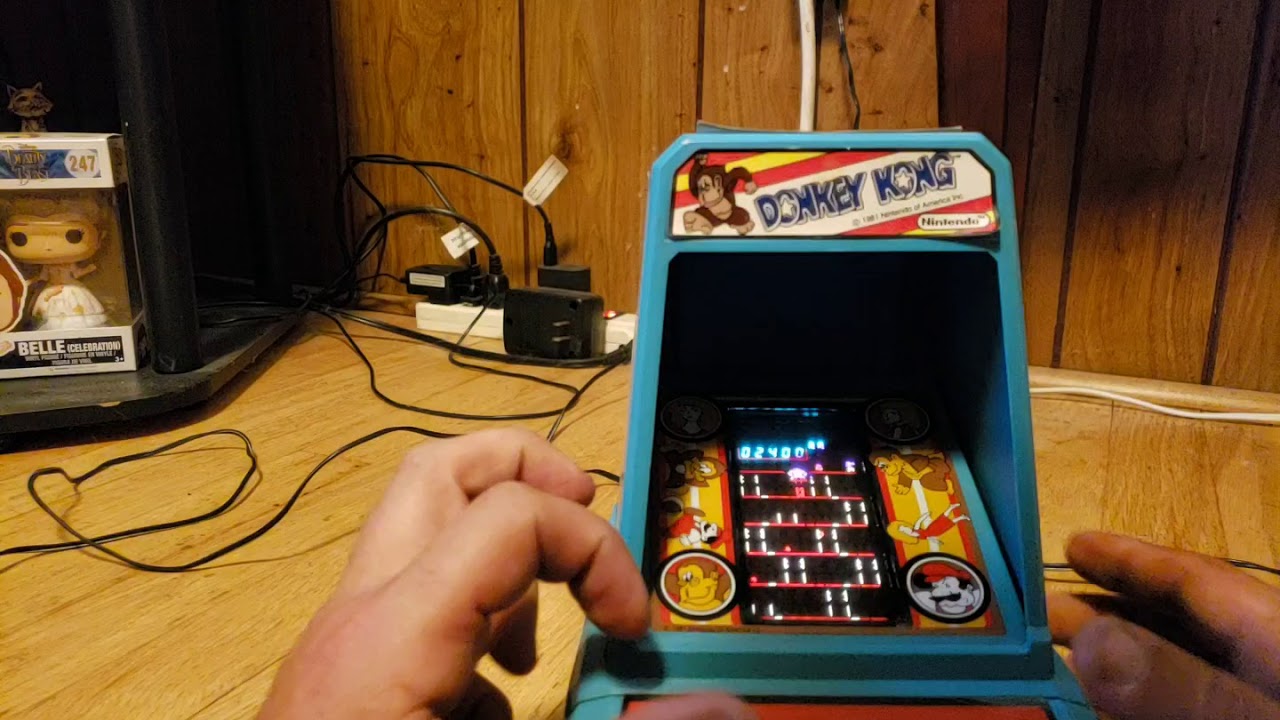 The Nintendork plays his Donkey Kong coleco tabletop game.