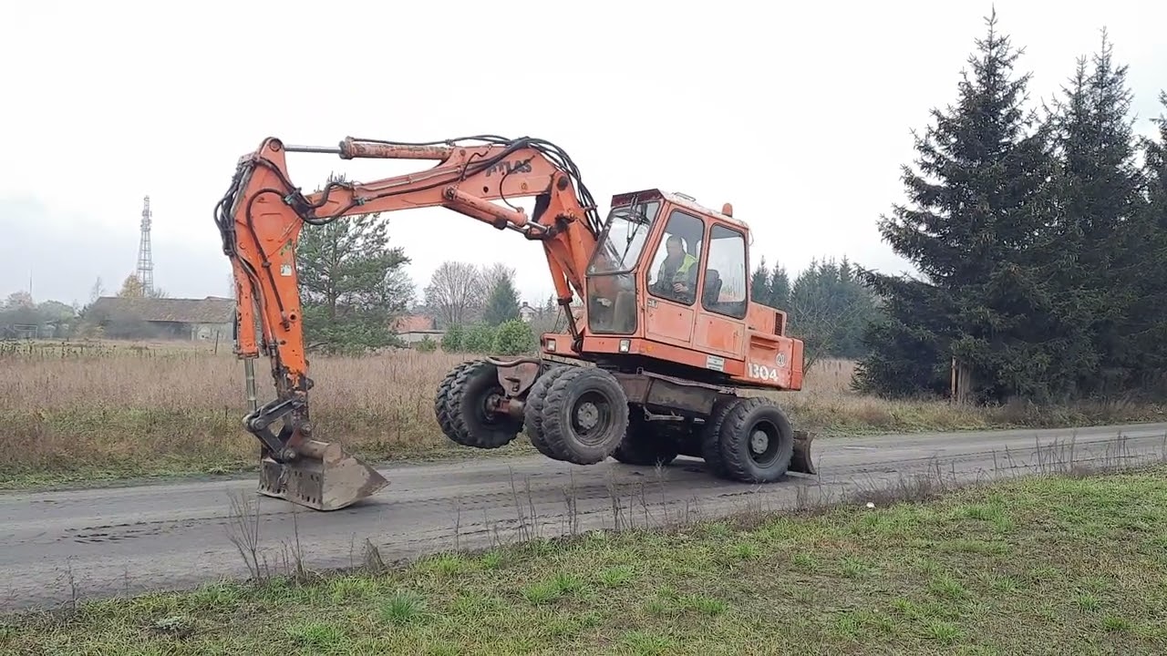 Koparka kołowa ATLAS 1304, 4x4 + chwytak, 2 łyżki na aukcji Flotilo.pl
