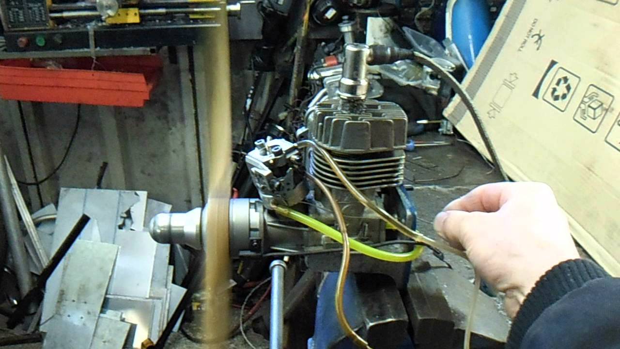 SUPER TIGRE S 2000 25 CC glow engine converted to petrol.