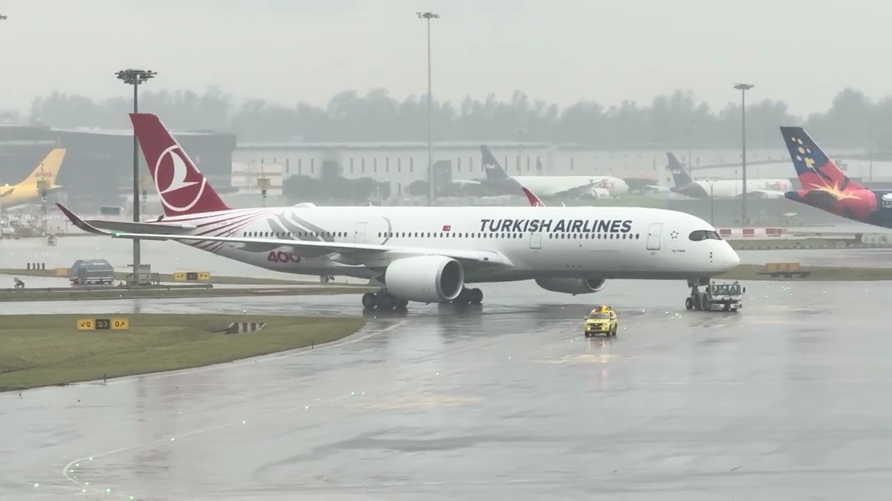 Turkish Airlines Airbus A350 TC-LGH TK209 being towed back to gate because of problem with nose gear