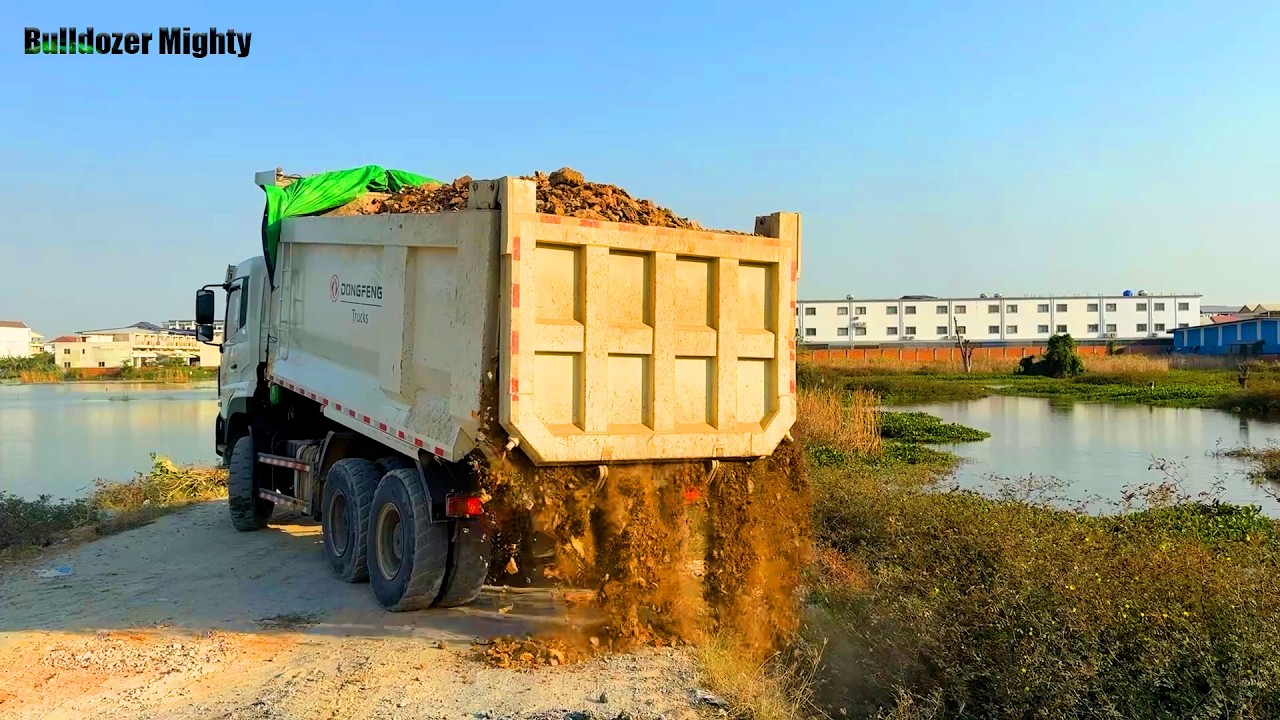 Processing Filling Up The Land huge,  Bulldozer SHANTUI DH17C3, Dump truck unloading