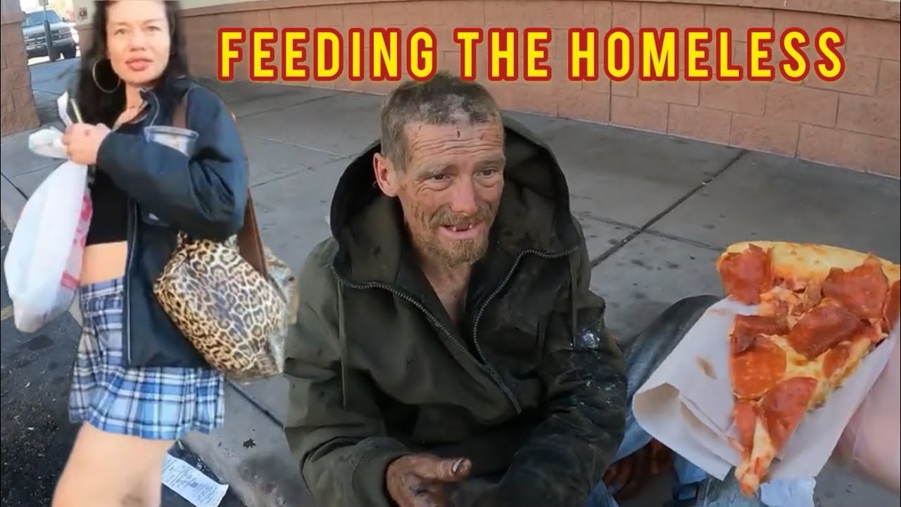 Giving pizza to the homeless