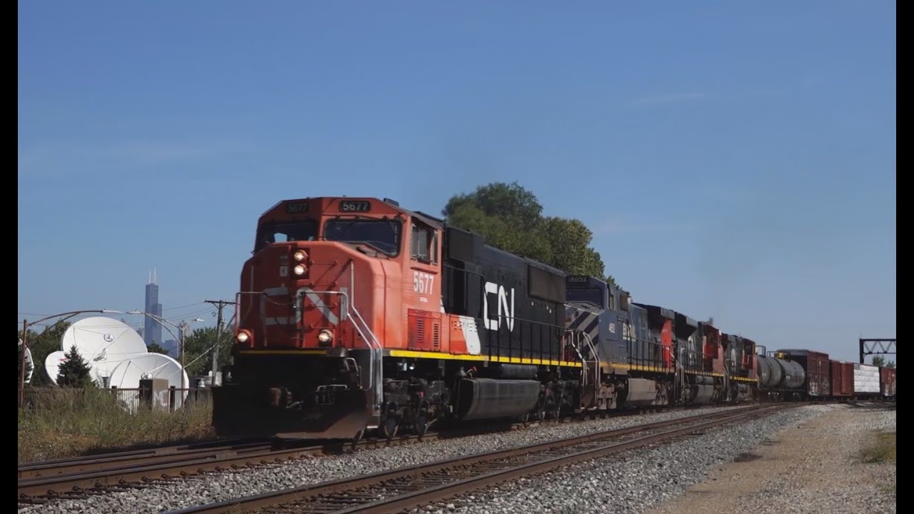CN 5677 Leads M337 At Ash Street Crossing, Chicago, IL 9-17-25