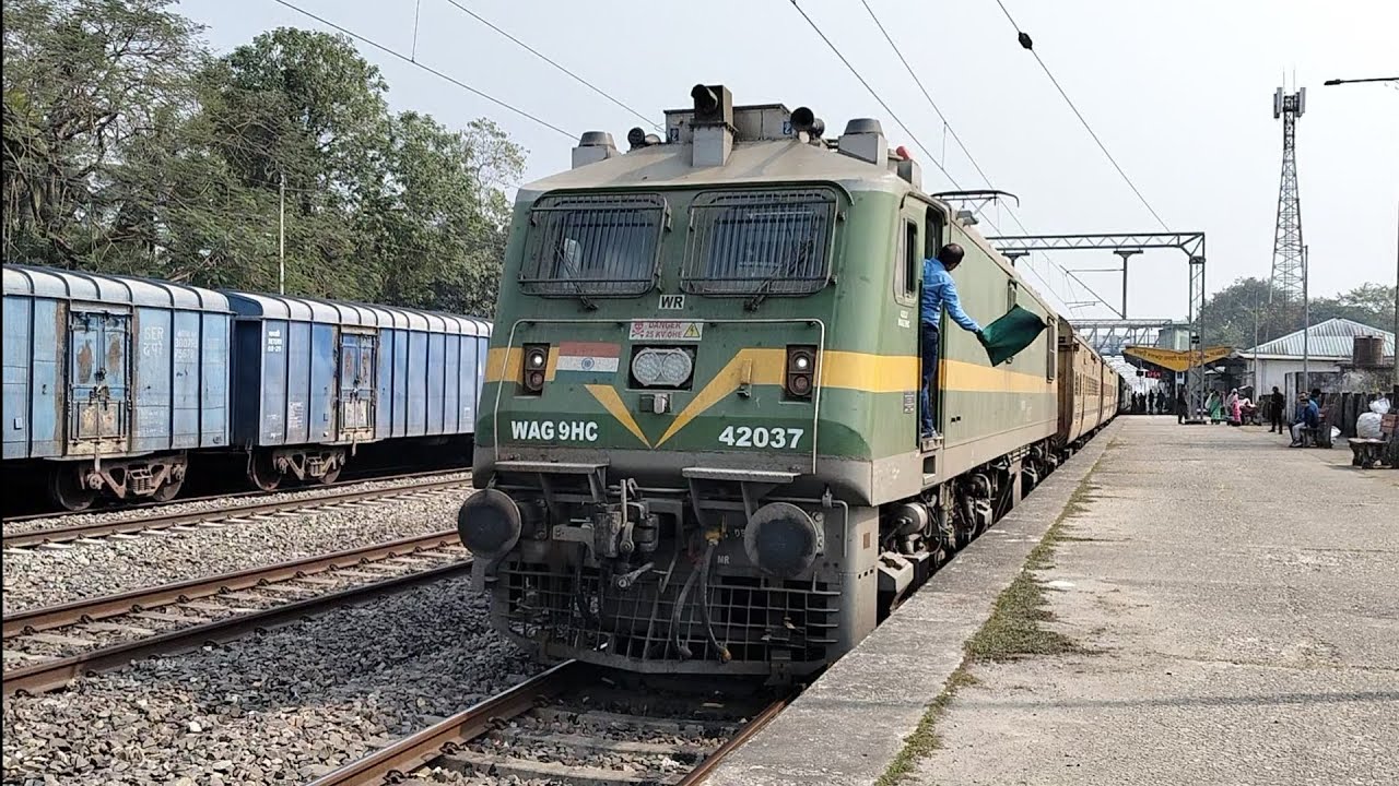 Vadodara WAG9hc departing Ambari Falakata with 55750 Haldibari - New Jalpaiguri Passenger Special 