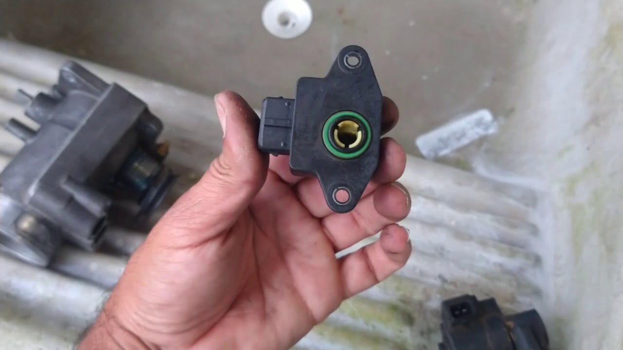 Limpeza do corpo do TBI do Vectra