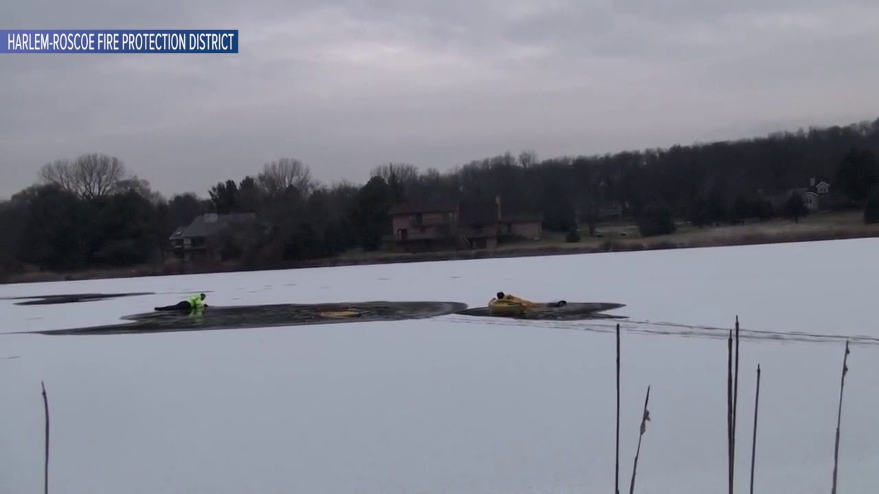 WATCH: Firefighter rescues dog that fell through ice on frozen lake