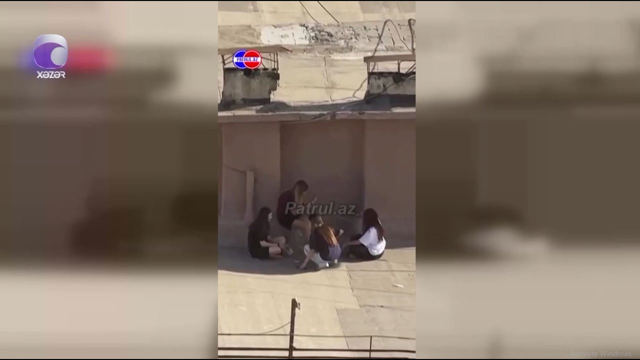 Polis binanın damında əylənərək şüşə qabları aşağı atan qızlarla bağlı hansı addımı atacaq?