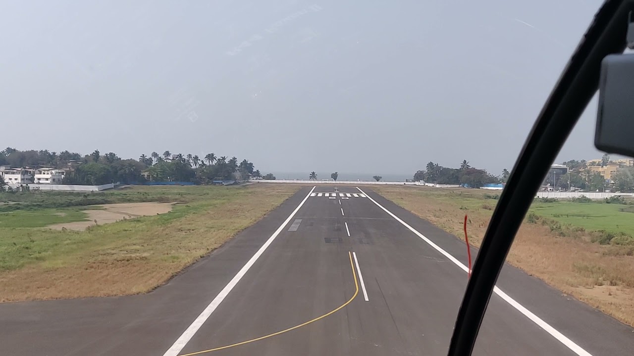 take off from Juhu airport, aerial view of Juhu