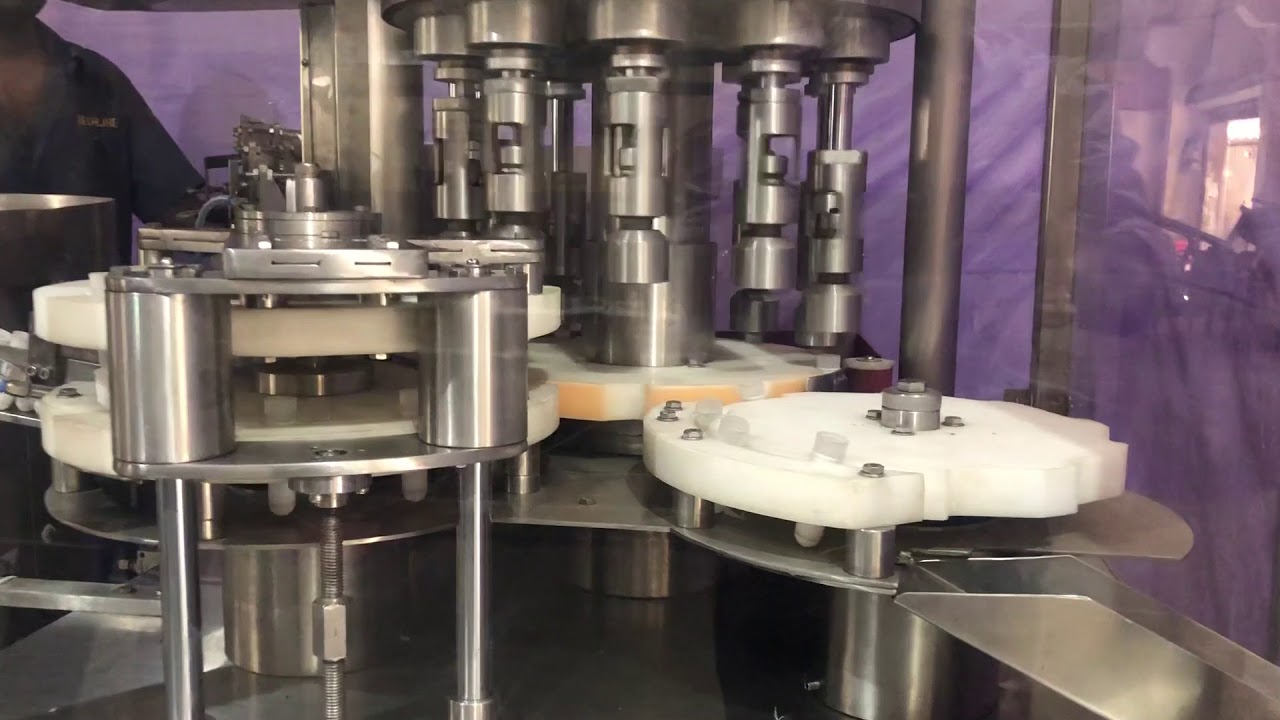 INHALER ASSEMBLING MACHINE