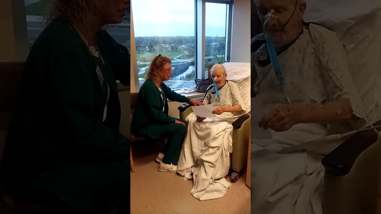 Nurse Brenda singing to dad