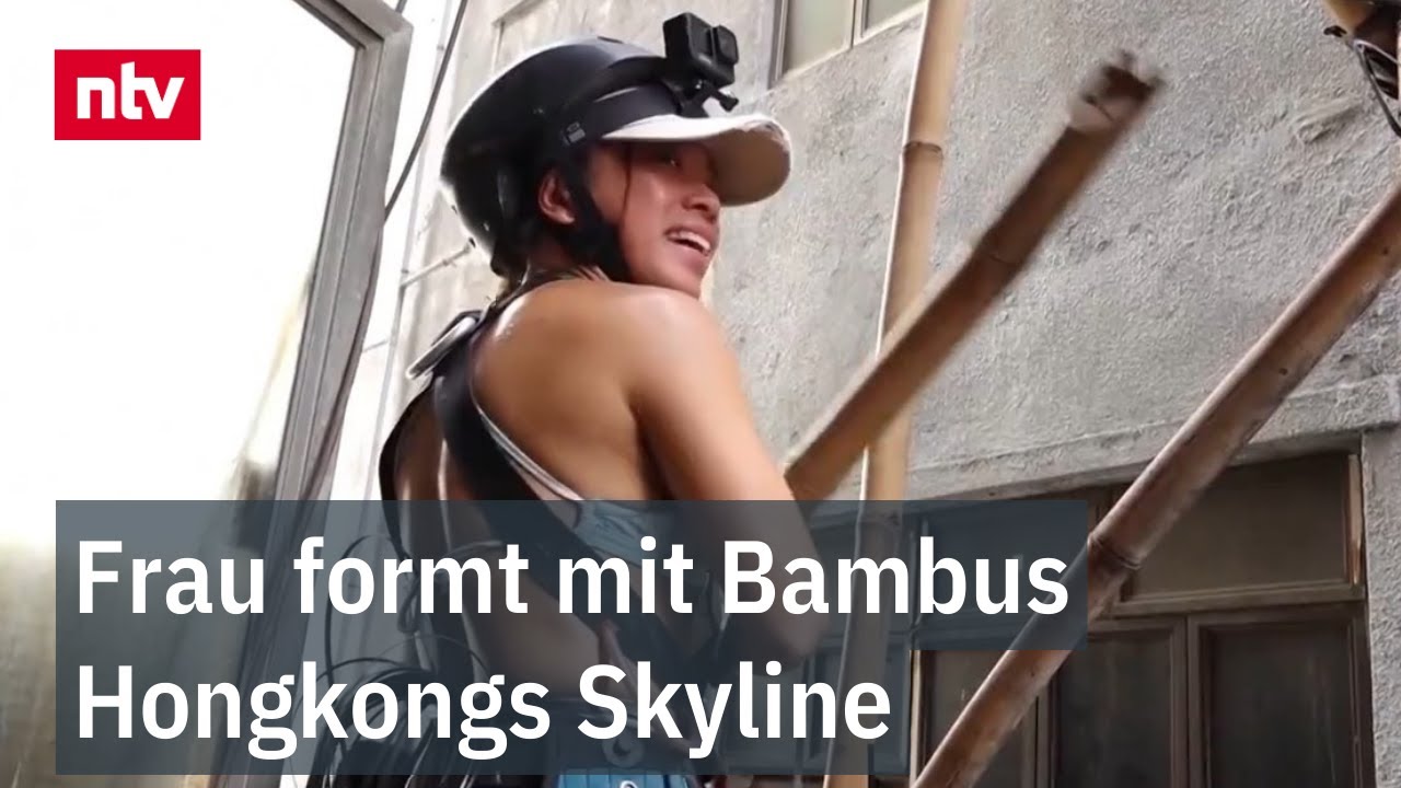 Frau formt mit Bambus Hongkongs Skyline - Jahrtausendealtes Handwerk