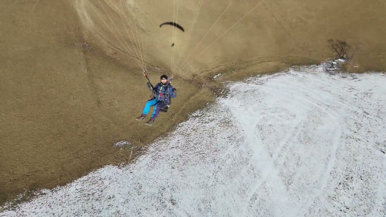 DJI Neo 2 drone follow paraglider 