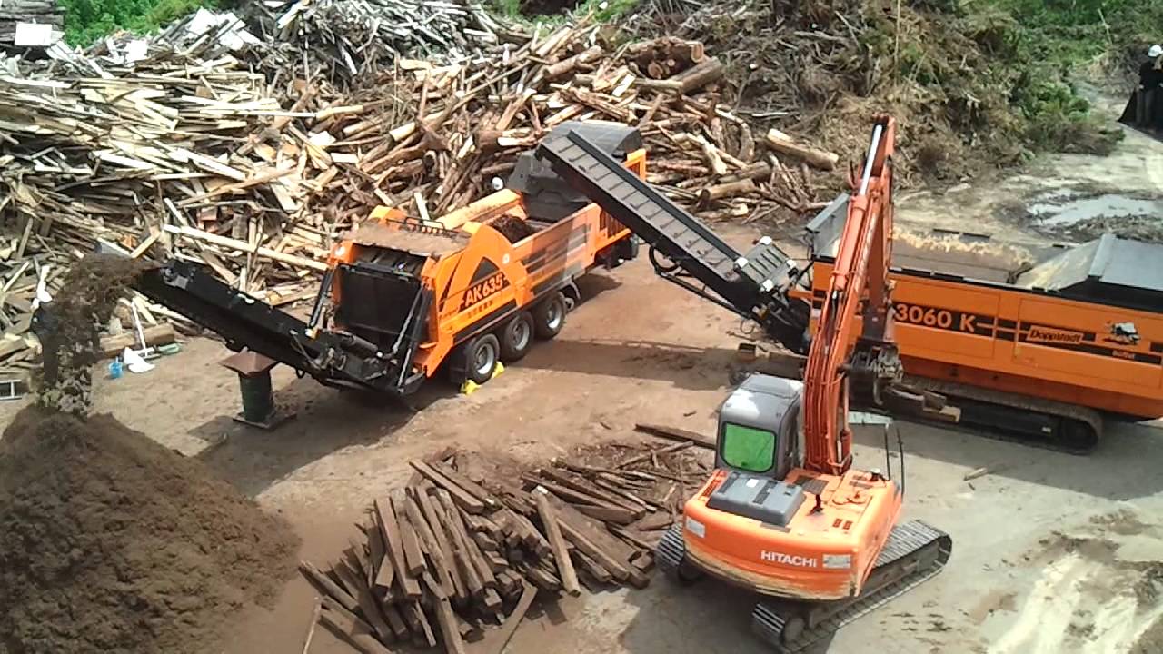 2012 08 24 10 36 17 doppstadt DW3060K and AK635 shredding railway sleeper