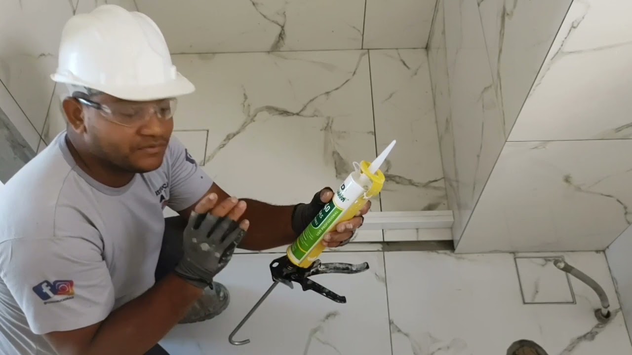 ASSENTAMENTO DE FILEITE DE BOX DE BANHEIRO.