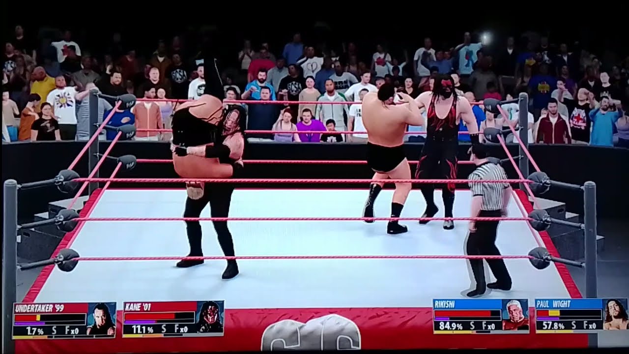 Undertaker y Kane vs Rikishi y Paul Wight