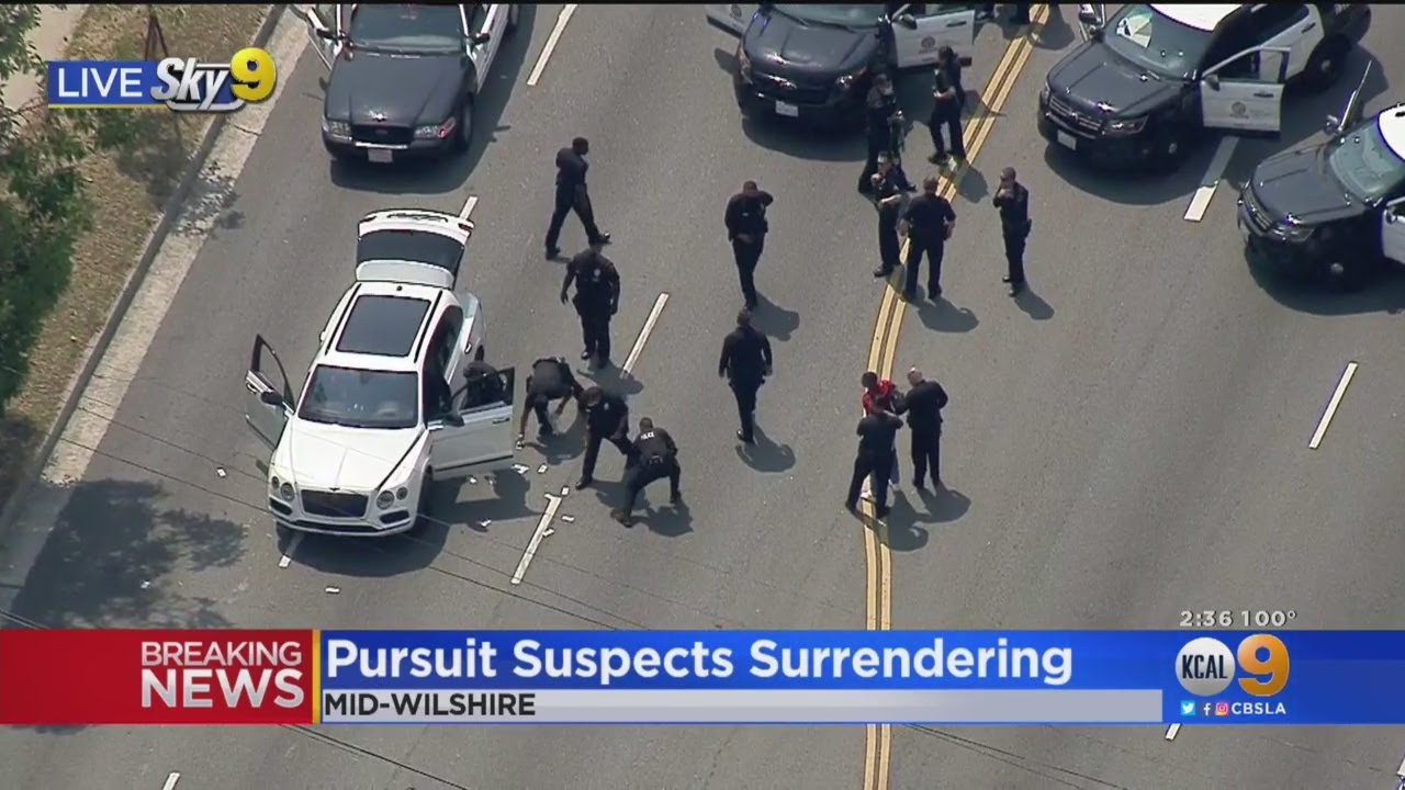 2 Surrender After Leading Chase In Bentley Spilling Cash