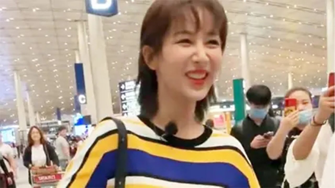 杨紫机场偶遇李现，喊出5字引热议，李现的反应暴露两人关系