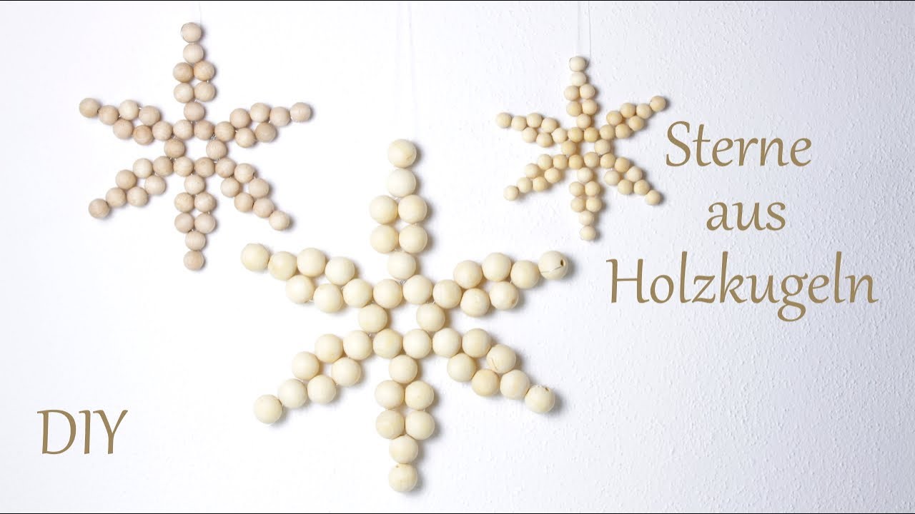 DIY | Sterne oder Schneeflocken aus Holzkugeln | schöne Advents- und Weihnachtsdeko | Just Deko