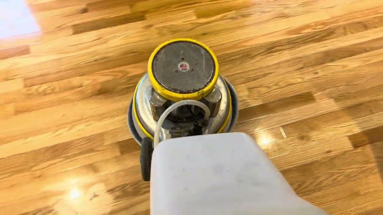 Cleaning & buffing some oak wood floor.