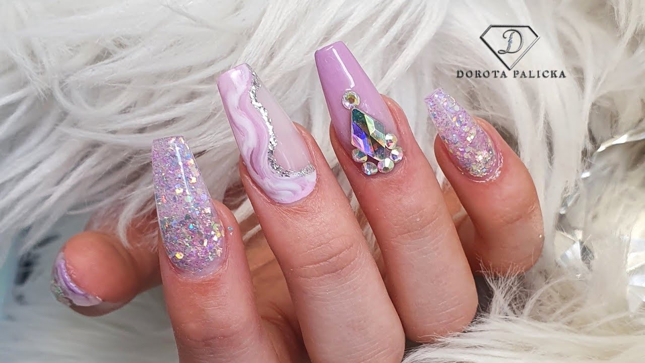 Lilac glitter encapsulation with ombre and marble gel nail extensions.