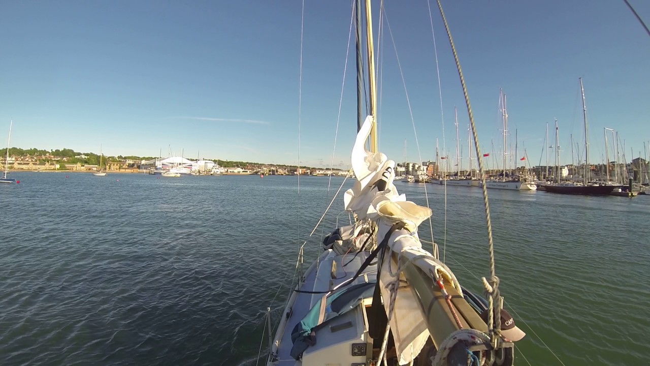 Westerly Centaur navigating Cowes Harbour entrance under engine