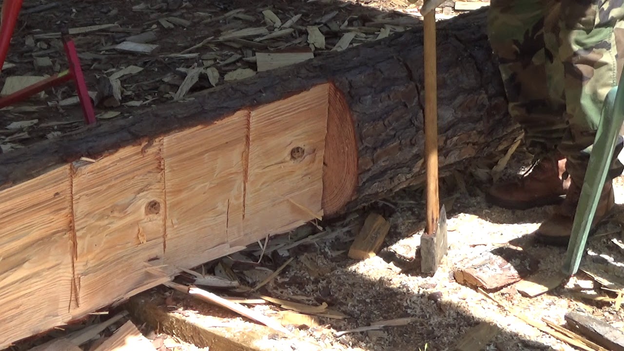 hand hewing or log cabin