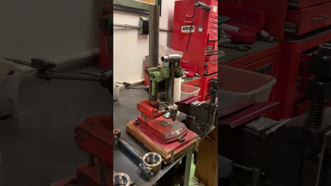 Straightening Rolls Royce Silver Ghost connecting rods after boring.