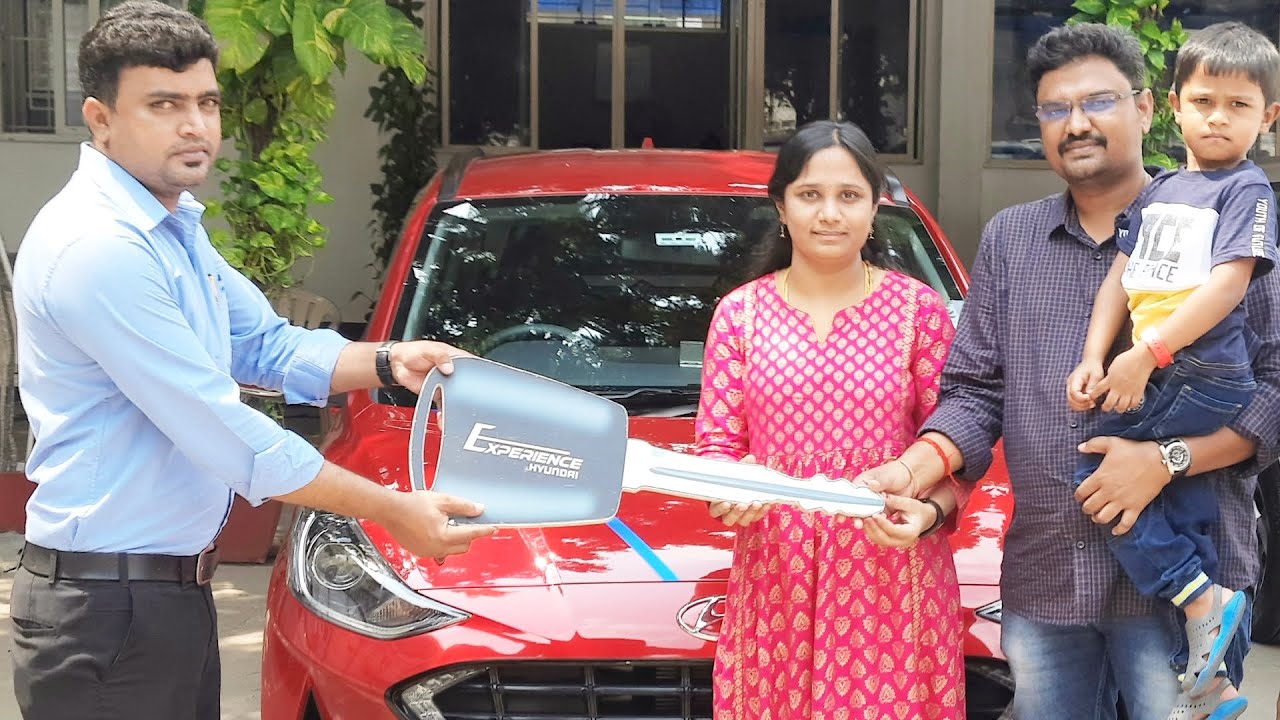 Taking delivery of Hyundai Grand i10 nios 2021 automatic | key handover of red automatic i10 nios