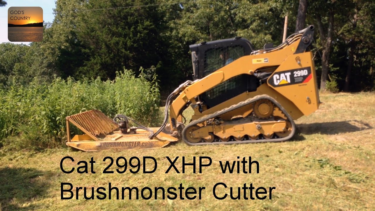 Cat 299D XHP Running a Brushmonster Rotary Cutter