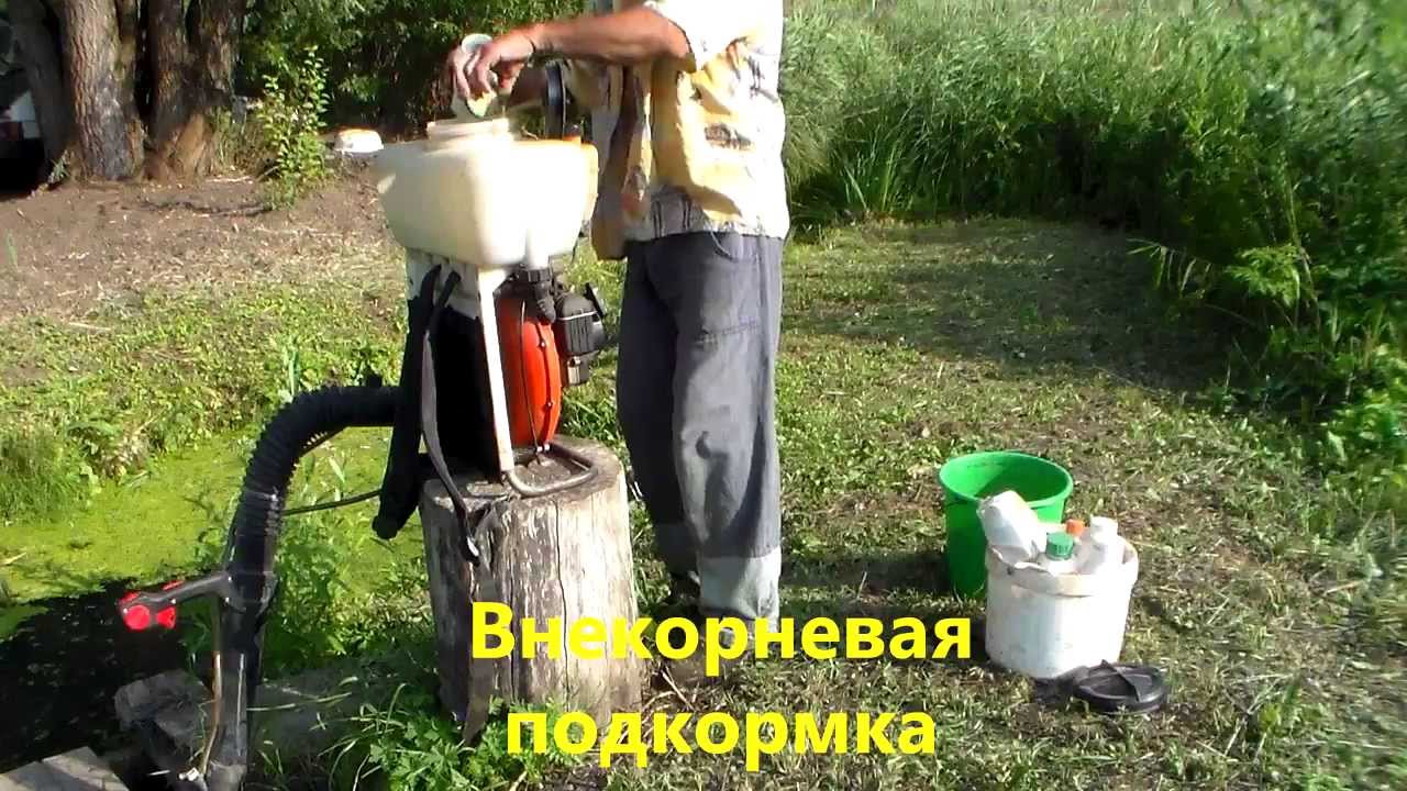 Работа мотоопрыскивателем Oleo-Mac. Италия